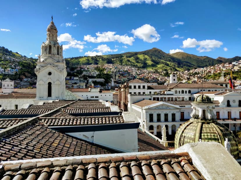 Ecuadorian highland city viewed from above with mountains beyond
