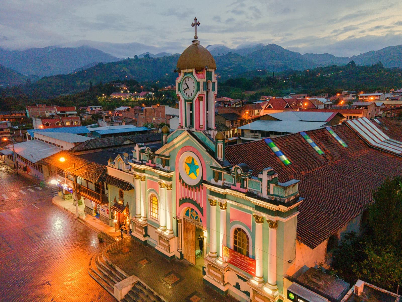 Colorful church and rooftops in an Ecuadorian highland city