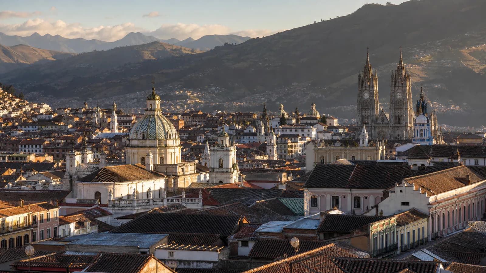Quito’s historic center and surrounding mountains at golden hour